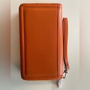 Leather Continental carry all clutch in box, never used, sienna